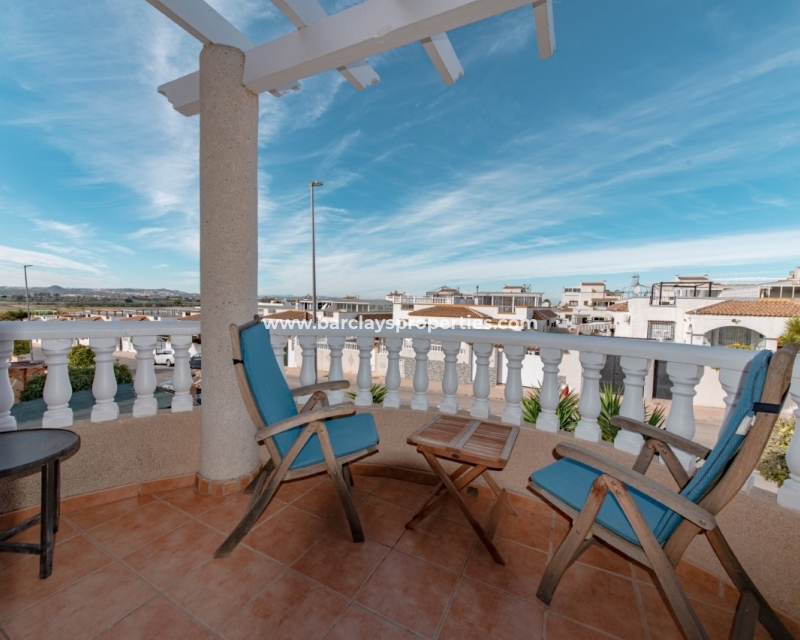 Terrace - villa for sale in urbanisation La Marina Spain